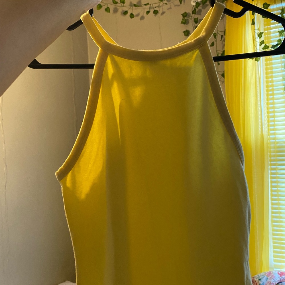 Cute fitted one piece snap yellow top